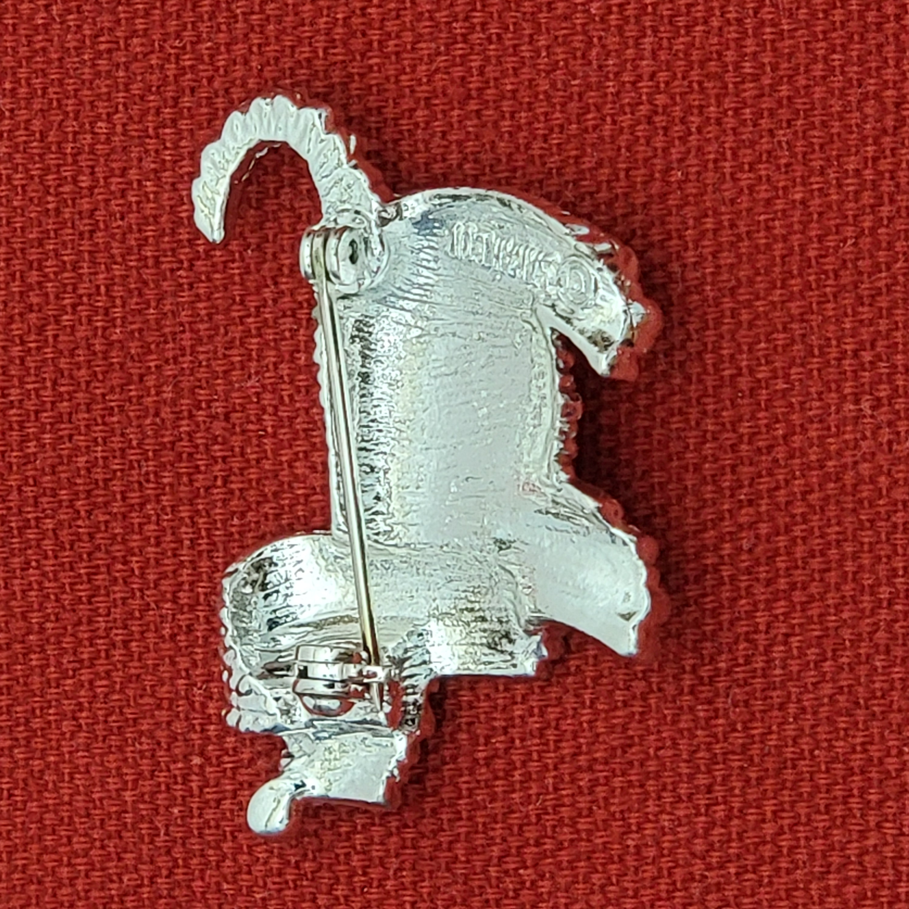 Dog brooch back view